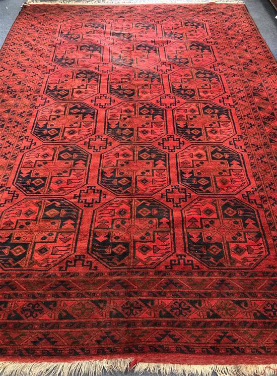 An Afghan carpet 365 x 254cm